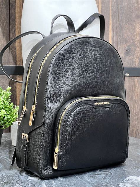 all black michael kors backpack|michael kors black backpack large.